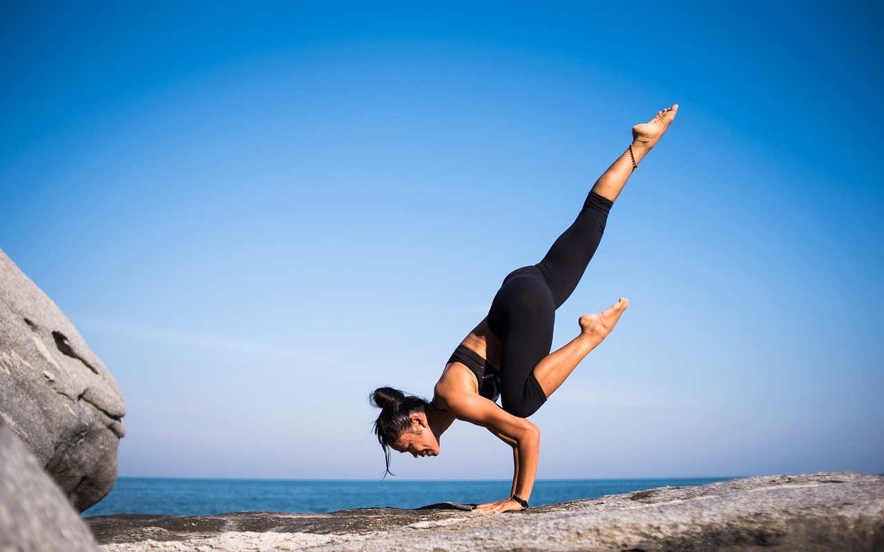 yoga, strength, nature, woman, balance, balancing, fit, fitness, young woman, fit woman, wellness, pose, yoga pose, posing, strength training, meditation, health, outdoors, beach, international yoga day